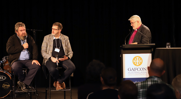 The Rev Peter Palmer from the Diocese of the Southern Cross speaks at the conference, alongside the Rev Peter Judge-Mears from Brisbane and Bishop Condie.