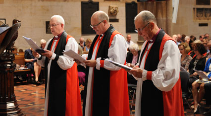 Bishops Watson and Piper present Bishop Edwards (centre) Photo: Ramon Williams