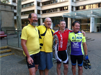 The riders posing for a photo after finishing