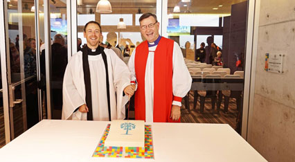 The Rev Stuart Starr and Archbishop Davies cut the cake at the opening ceremony (Sharon's Photography)