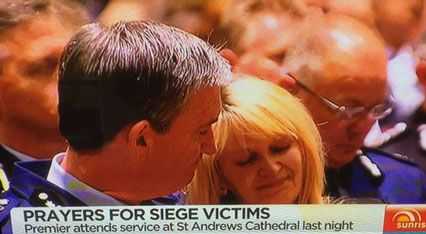 Police Commissioner Andrew Scipione and his wife Joy during an emotional moment of the service (Ch 7 News)