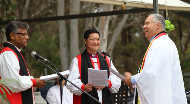 Archbishop Raffel, Bishop Peter Lin and the Rev Michael Duckett