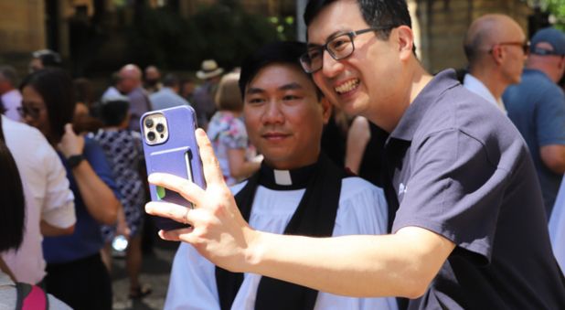 Families and friends gather around new deacons