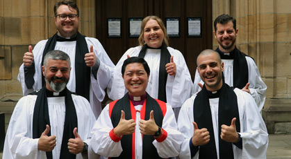 Thumbs up from Bishop Peter Lin and new ministers for the Georges River region
